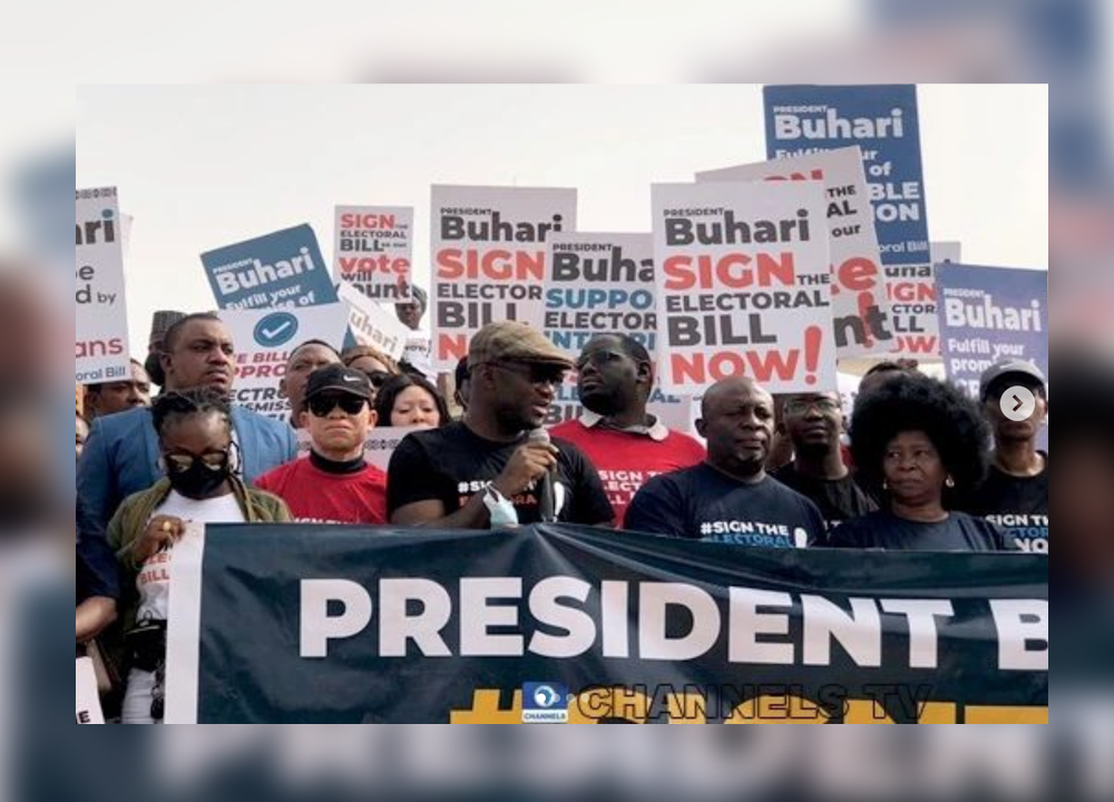 PHOTOS: Protest Rocks Abuja Over Buhari’s Refusal To Sign Electoral Bill