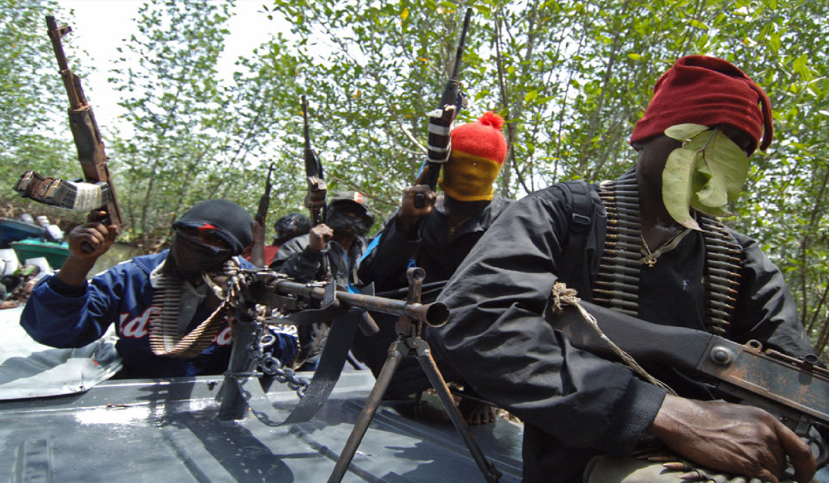 Gunmen Attack a Bullion Van, Killing a Bank Official and Injuring Police Officers.