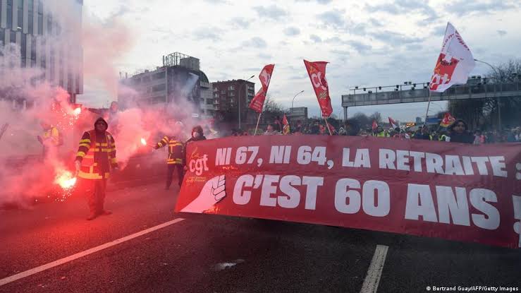 Police Clash with Protesters as French Government Passes Pension Reforms without Vote in Parliament.